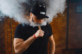 Man vaping with high-end vaping device from vape2stop